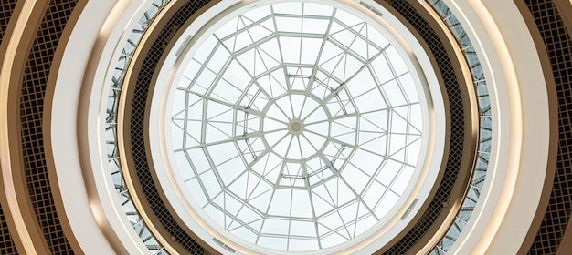 Bottom view of modern wheel like glass ceiling