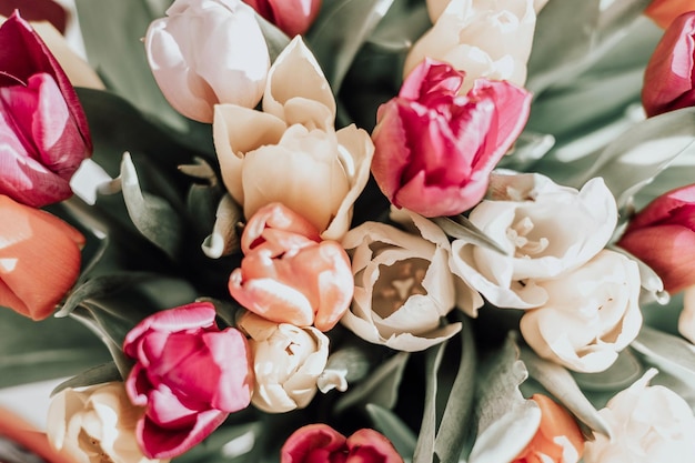 Bouquet of bright colorful tulips Beautiful floral background Spring flowers Top view copy space