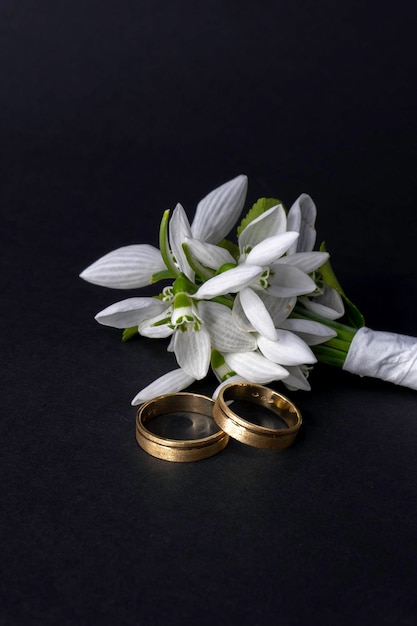 A bouquet of flowers with a bouquet of white flowers on it