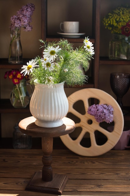 Bouquet of flowers on a wooden background Rustic style concept and flower shop