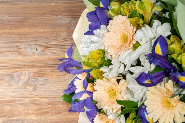 Bouquet of flowers on a wooden table