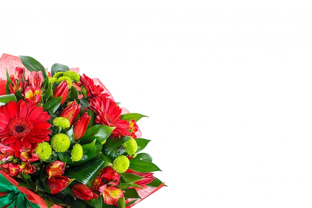 Bouquet of gerberas on a white wall