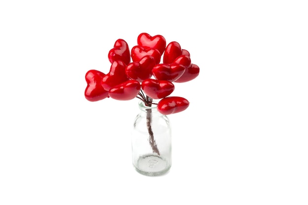 Bouquet of hearts in the glass bottle isolated on white background