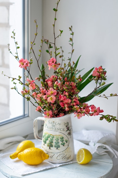 bouquet of spring flowers and lemons