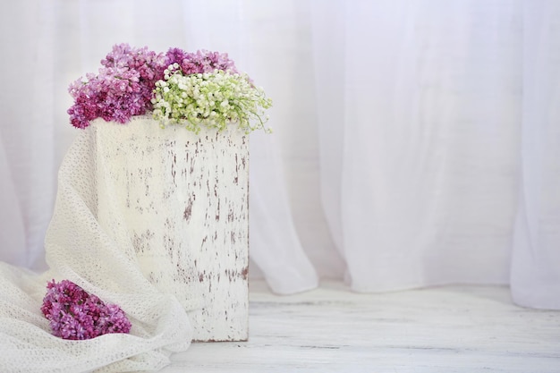 Bouquet of spring flowers on light background