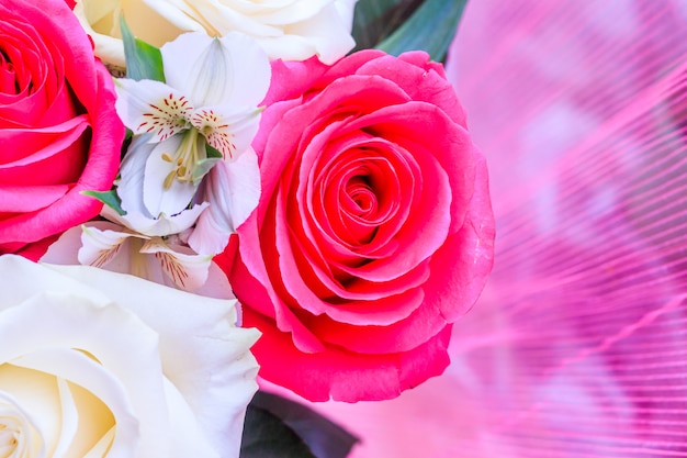 Bouquet with bright flowers . A background of floral roses. Beautiful flowers. A gift for the holiday.