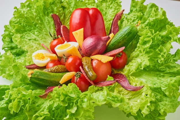 Bouquet with ingredients for healthy nutririon or diet. Lettuce with eggs and fresh vegetables