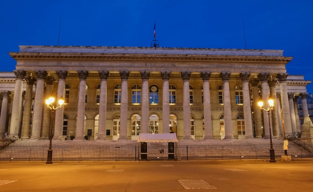 The Bourse of Paris Brongniart palace at nightParis France