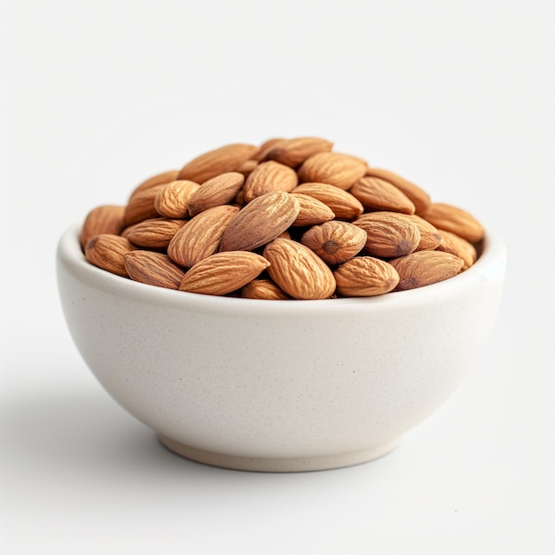 a bowl of almonds with a white background