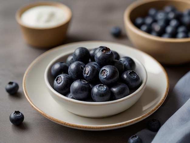 a bowl of blueberries with a spoon in it