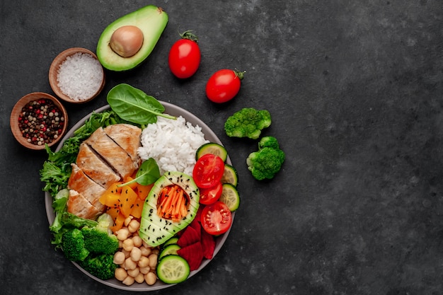 Bowl Buddha. rice, chicken breast, broccoli, pumpkin, avocado, chickpeas, carrots, cucumber, beets