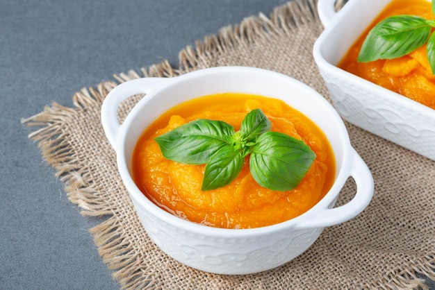 Bowl of delicious autumn pumpkin soup Copy space