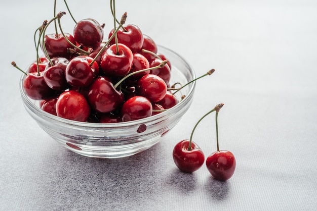 A bowl of delicious red cherries, summer fruits and refreshment, summer fruits containing vitamins