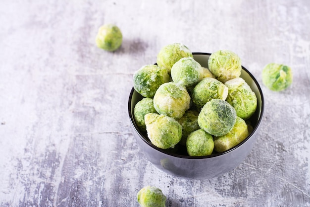 A bowl of frozen brussels sprouts on the table Vegetable diet