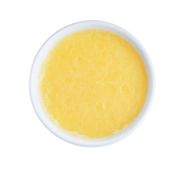 Bowl of Ghee butter isolated on white top view