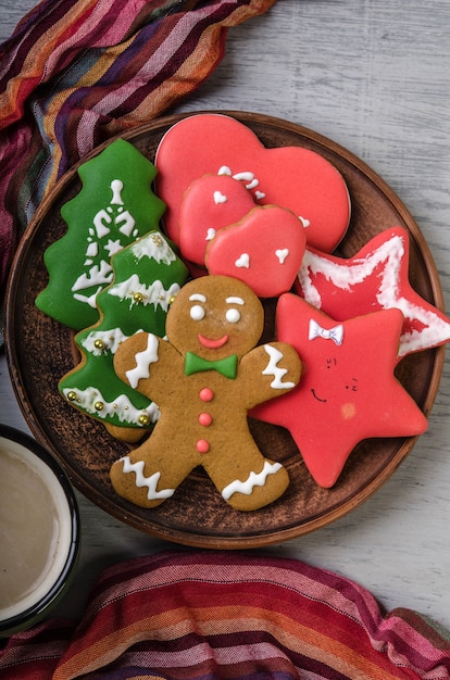 Bowl of gingerbread cookies wrapped in scarf