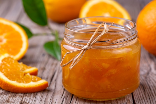 Bowl of orange jam isolated