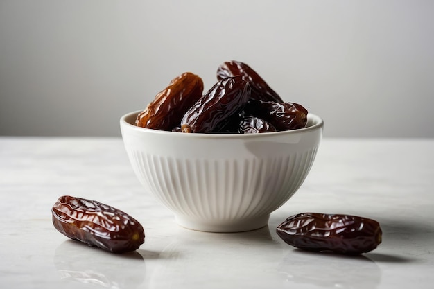 Bowl of Plump Dates on a Simple Background