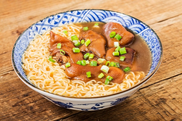 A bowl of pork knuckle noodles