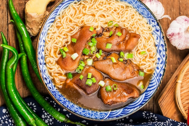 A bowl of pork knuckle noodles