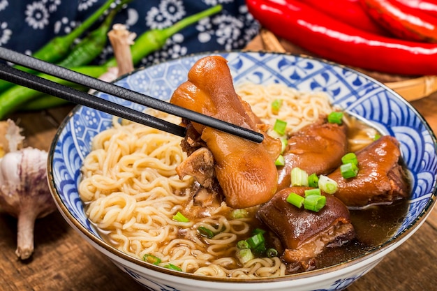 A bowl of pork knuckle noodles