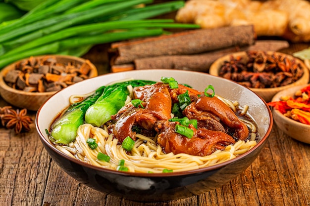 A bowl of pork knuckle noodles