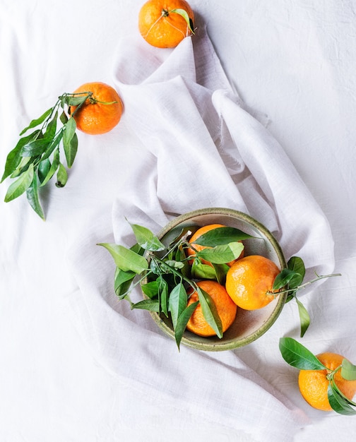 Bowl of Tangerines with leaves