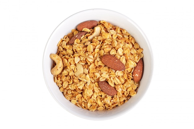 Bowl of whole grain muesli isolated