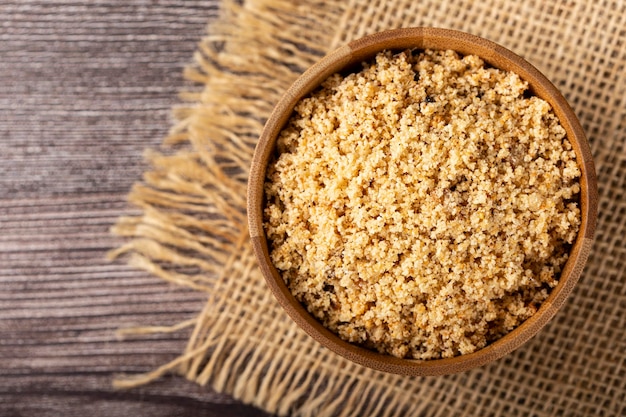 Bowl with Brazilian farofa. Made with manioc flour.