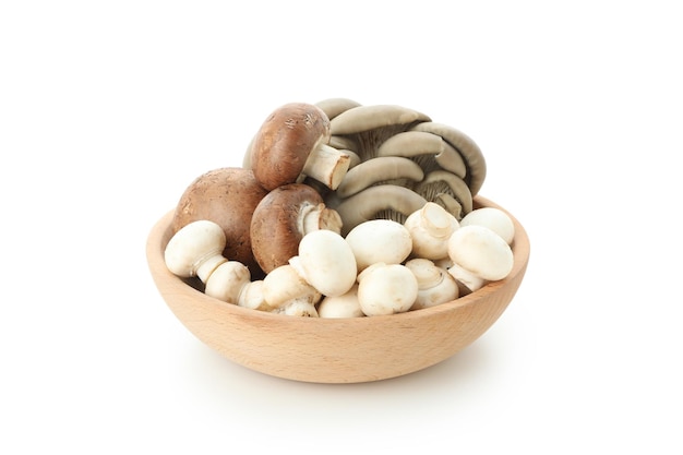 Bowl with champignon mushrooms isolated on white background