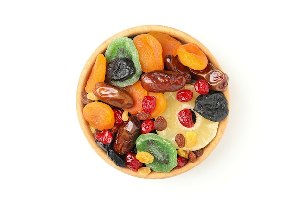 Bowl with dried fruits isolated on white