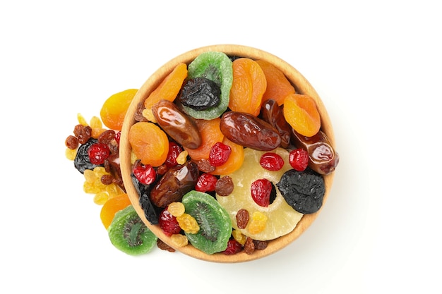 Bowl with dried fruits isolated on white