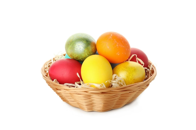 Bowl with Easter eggs isolated on white background