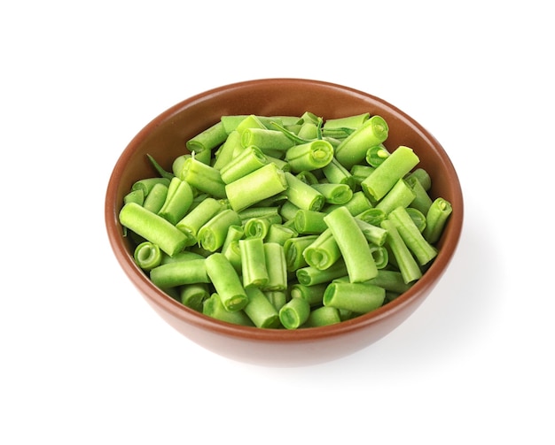 Bowl with fresh green beans on white background