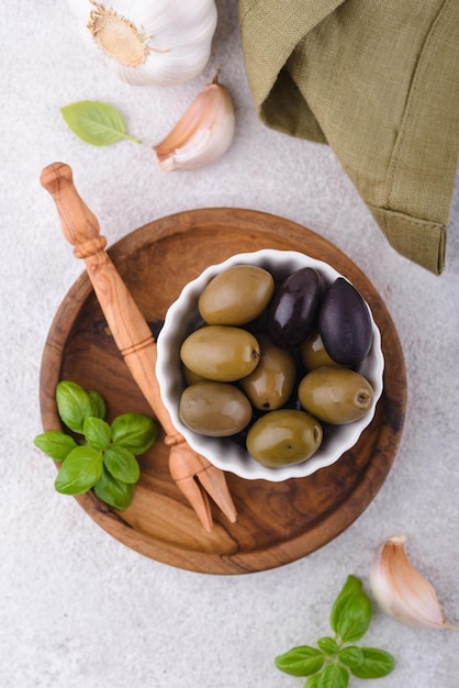 Bowl with greek green and black olives