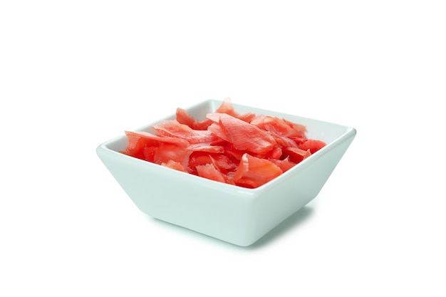 Bowl with red pickled ginger isolated on white