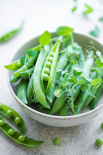 Bowl with sweet pea pods