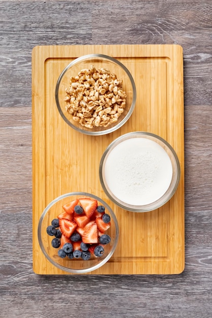 Bowls with ingredients for a healthy breakfast