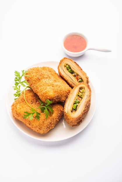 Box Patties, Delicious deep fried south Iasian pastry snack filled with something savory and Coated with Bread Crumb