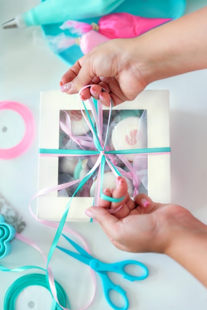 A box of sweets tied with ribbons