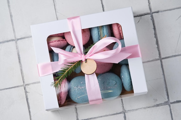 A box with classic French macarons Delicious and beautiful cakes