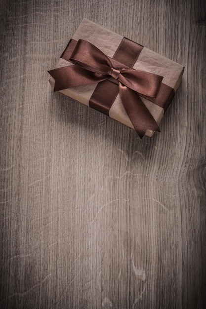 Boxed vintage present container on wooden board holiday concept copyspace