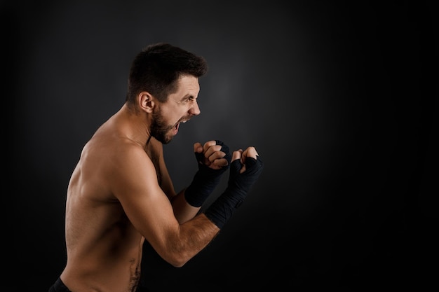 Boxer throwing a fierce and powerful punch