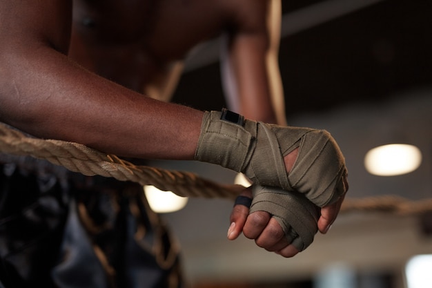 Boxer training on boxing ring