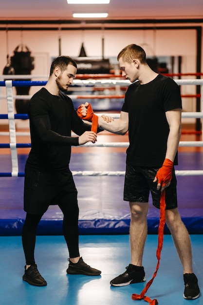 Boxers train in the ring and in the gym