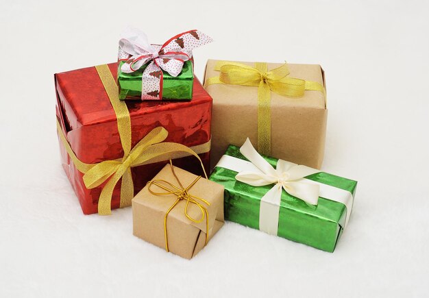 Boxes with Christmas gifts on a white background.