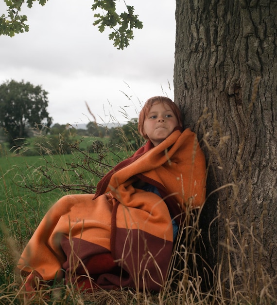 Boy 9 years old in the field