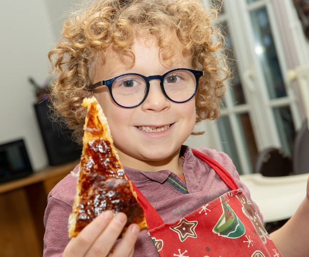 Boy eating a piece of cake