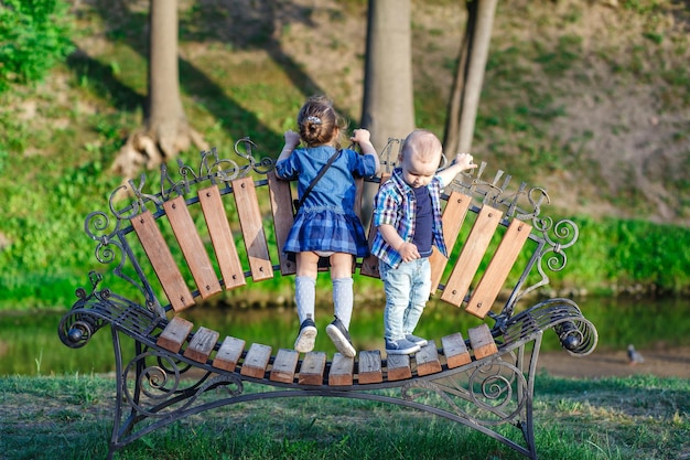 boy and girl playing in the garden