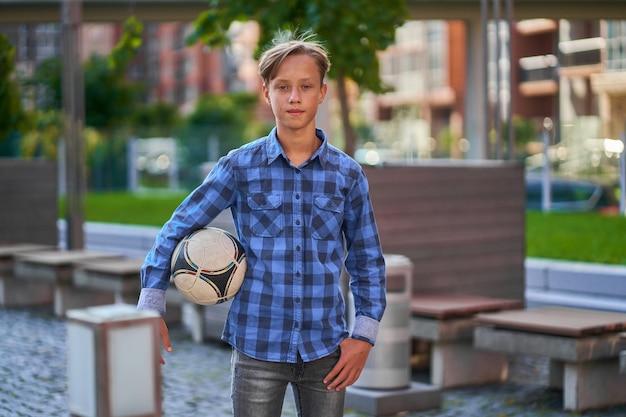 Boy goes to play soccer with friends.